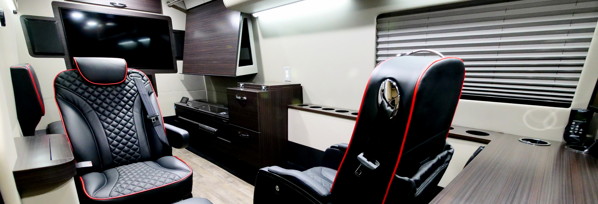 Mobile office designed for mechanical engineers equipped with full workstations, blueprint reader, 3D Printer, dual TV displays, and more!